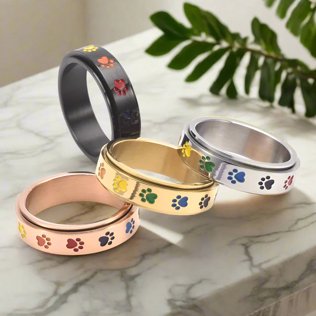 Spinning Stress Reducing Paw Ring | Stainless Steel with Rainbow Paws